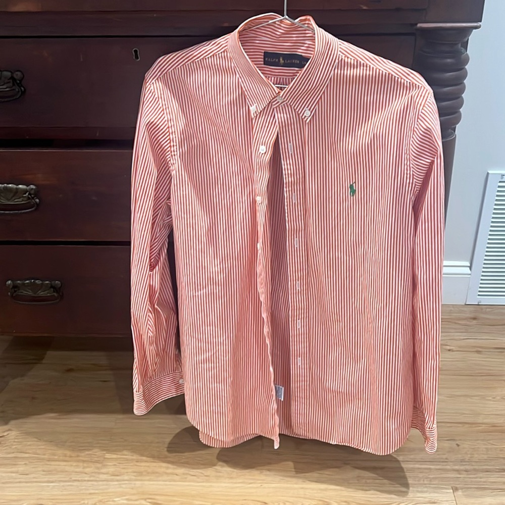 Men’s orange and white polo